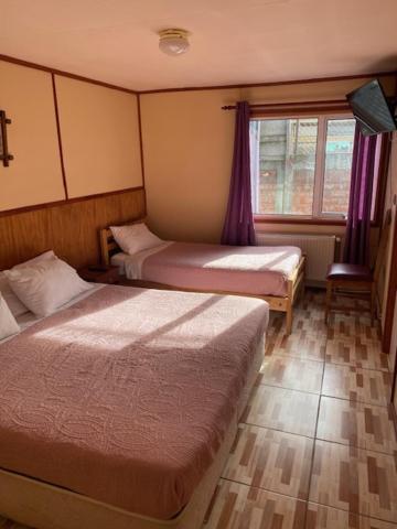 Nikos II Adventure Vandrehjem Puerto Natales Eksteriør billede